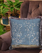 Decorative pillow with a floral motif