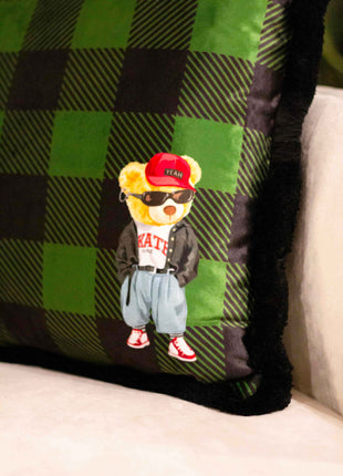 Checked decorative pillow with a teddy bear motif