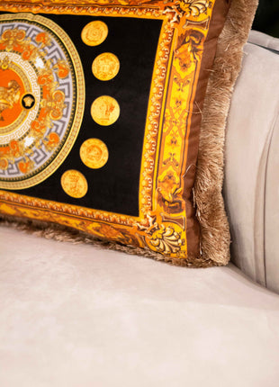 Decorative pillow with gold accents