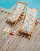 Deckchair with beige fabric and a plant motif